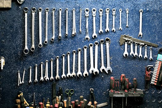 keys-workshop-mechanic-tools-162553-162553 Neatly arranged wrenches and tools on a workshop wall, ideal for mechanics.